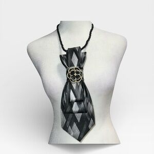 Elegant Black and Silver necktie Necklace with Floral Accent